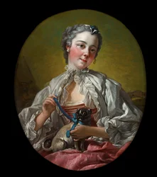 A Young Lady Holding a Pug Dog